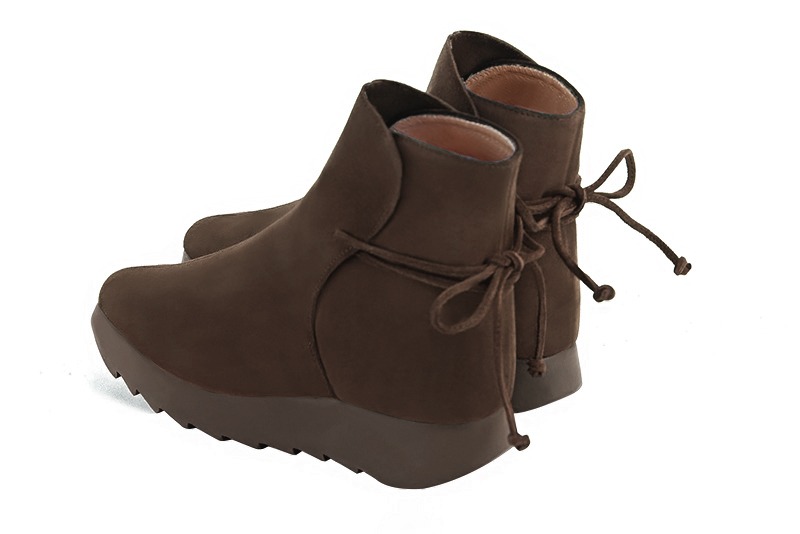 Chocolate brown women's ankle boots with laces at the back. Square toe. Low rubber soles. Rear view - Florence KOOIJMAN